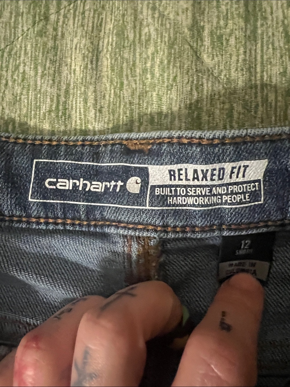 Woman’s Carhartt Relaxed Fit Denim Jeans in Medium Blue